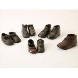 Collection of 7 antique bronze/burnished children's shoes and a later pair, various models/sizes,