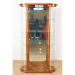 Walnut oval modern display cabinet with 4 glass shelves, 174 x 96 x 38 cm.
