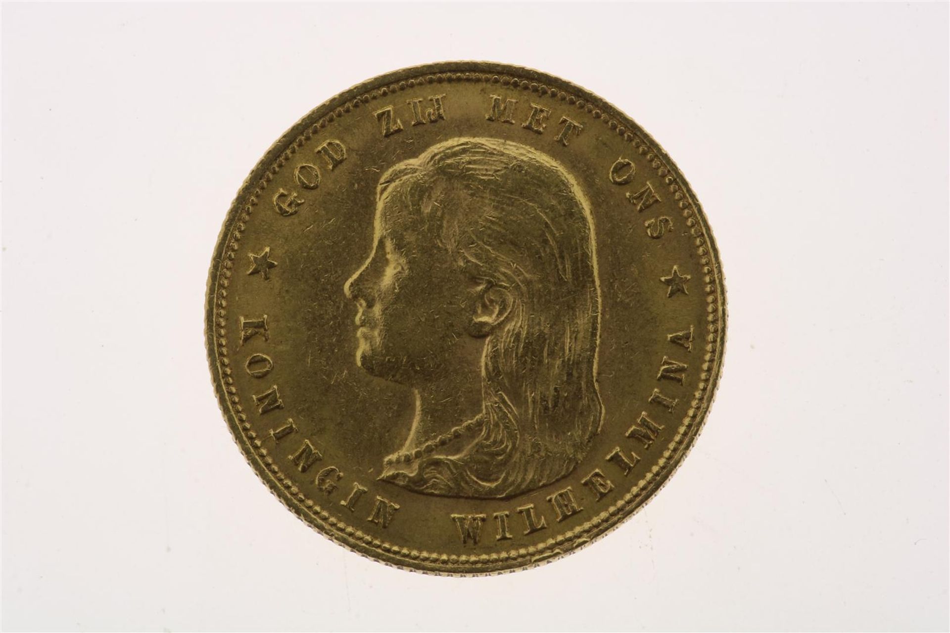 Golden tenner with image of Wilhelmina as a girl with hanging long hair, looking to the left,