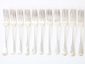 Lot silver cutlery with 11 forks, England, 19th century