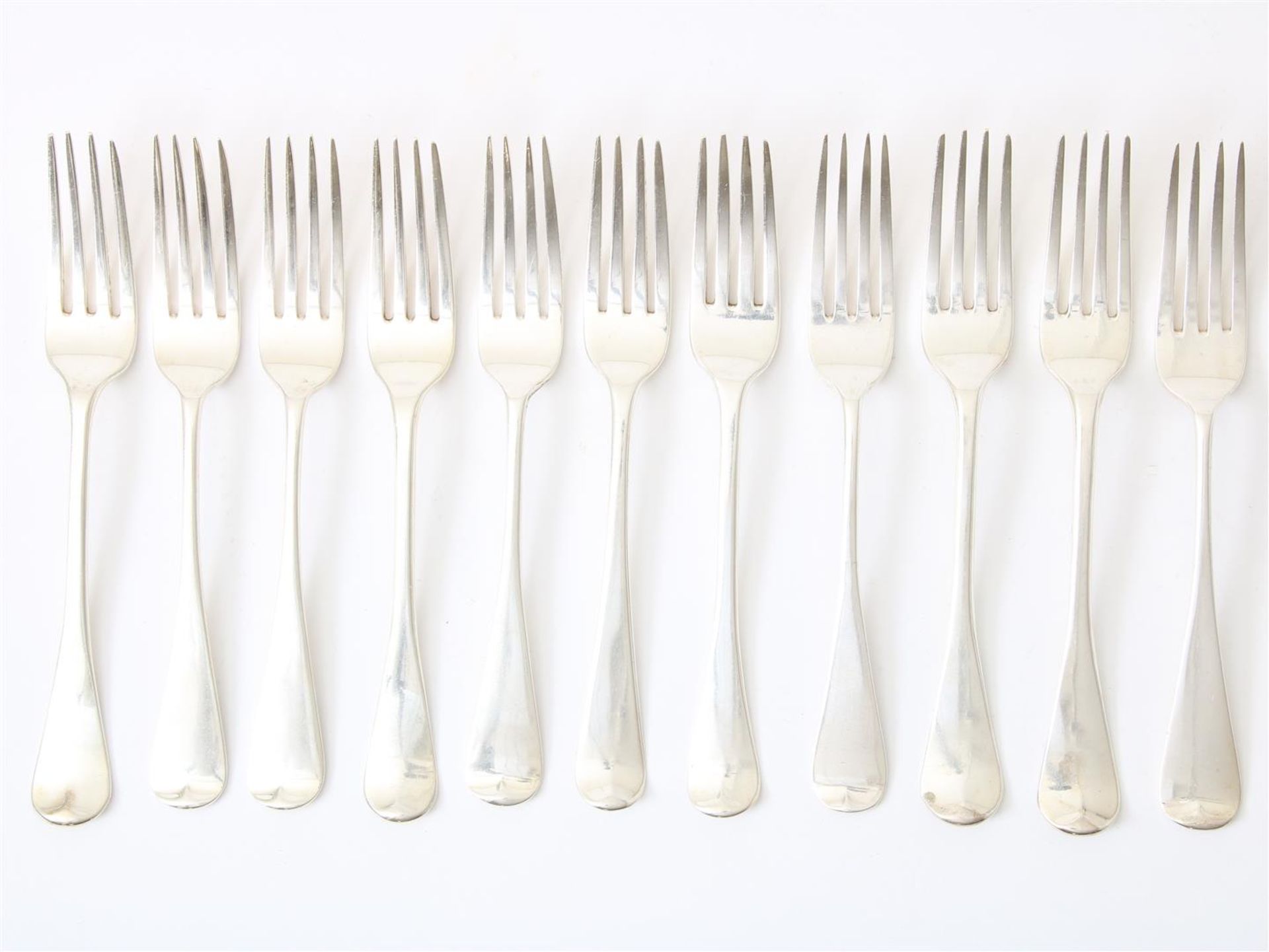 Lot silver cutlery with 11 forks, England, 19th century 