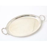 Silver tray with decorative palmette trim and pearl edge