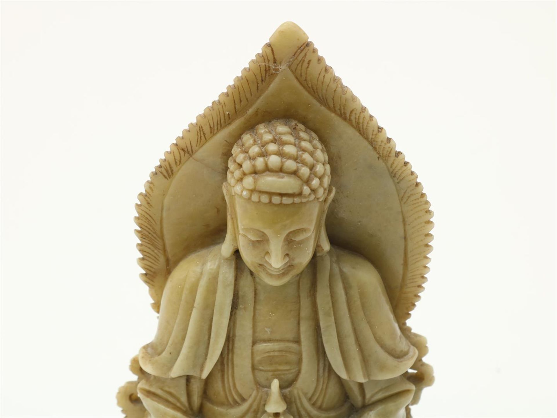 Soapstone sculpture of sitting Buddha on lotus flower, China, 20th century, height 23 cm. (edge - Image 2 of 5