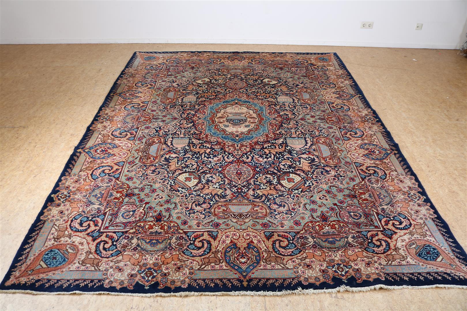 Carpet, Kaschmar 340 x 245 cm. with decorations of flora and fauna, deer, birds and flower vases.