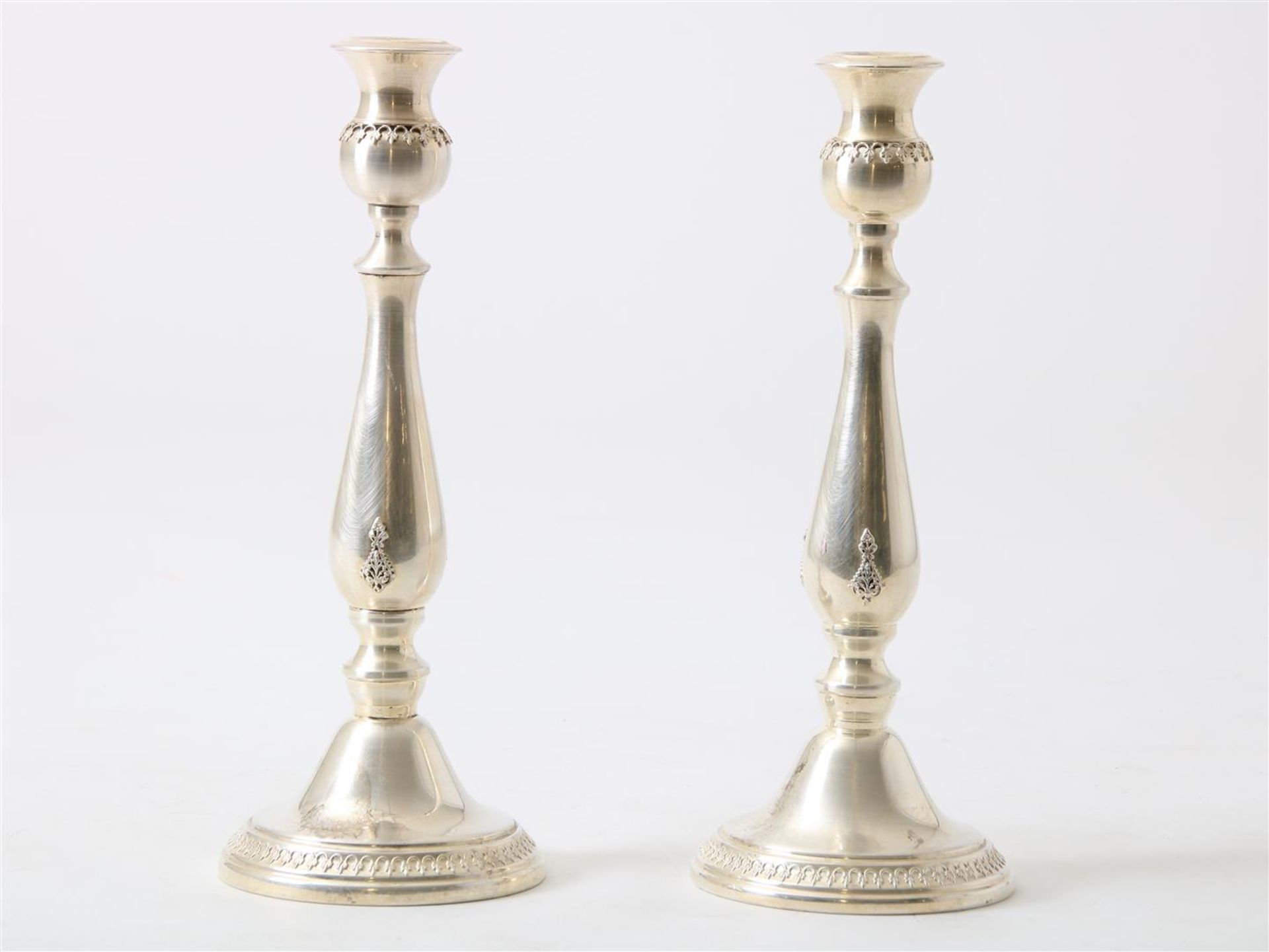 A pair of silver candlesticks