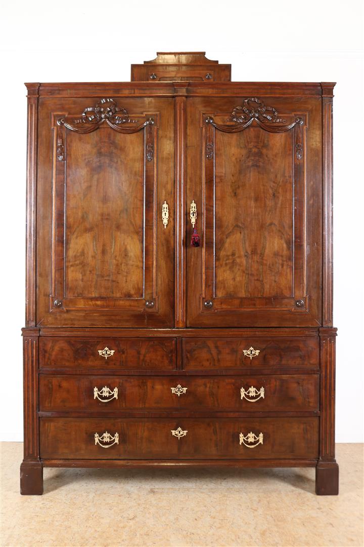 Mahogany Louis XVI cabinet, 2 panel doors with carved garlands and 4 drawers with bronze fittings,