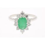 White gold ring with emerald and diamond, brilliant cut