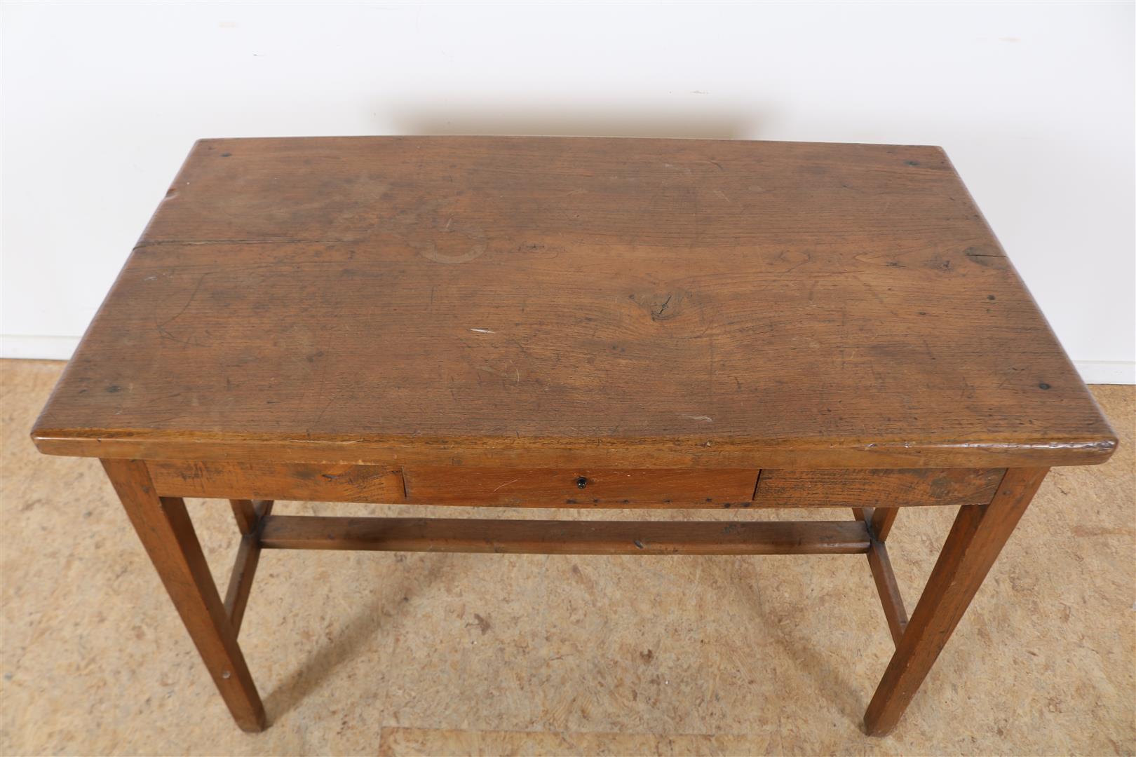 Teak kitchen table with drawer, resting block legs connected by rules, Indonesia, 68 x 103 x 57 cm. - Image 2 of 4