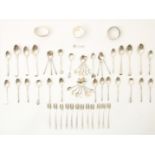 Lot of silver spoons consisting of various teaspoons, cake forks, 2 napkin rings, cup, etc. Dutch