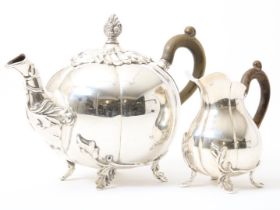 Silver teapot and creamer