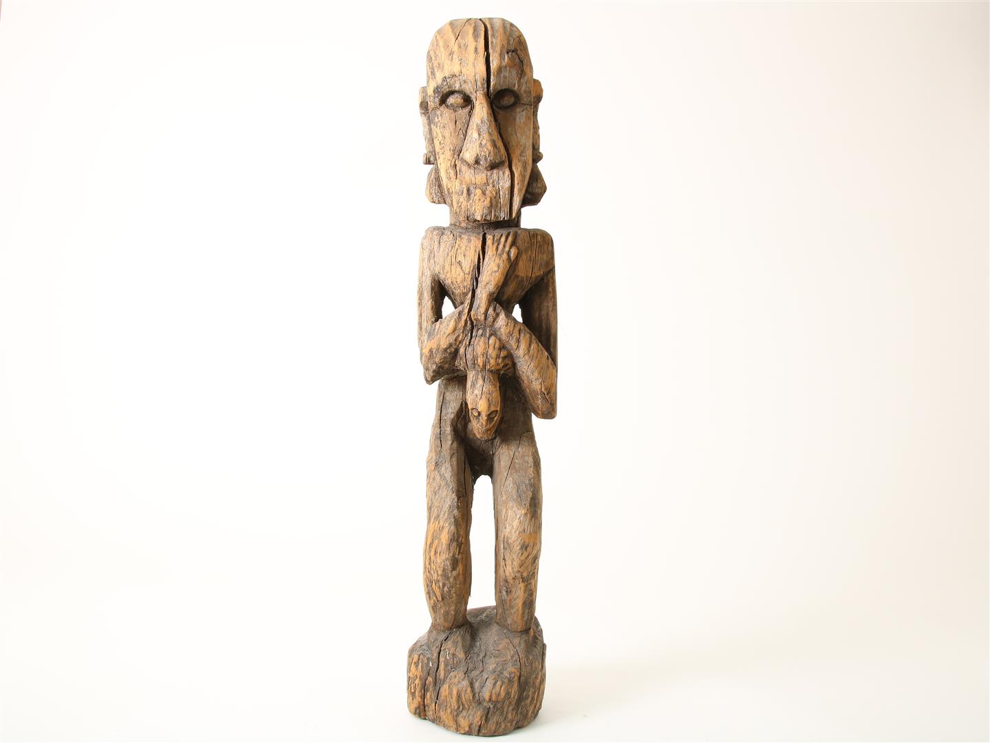 Wooden carved sculpture of standing ancestral figure, probably Southeast Moluccas, height 88 cm.