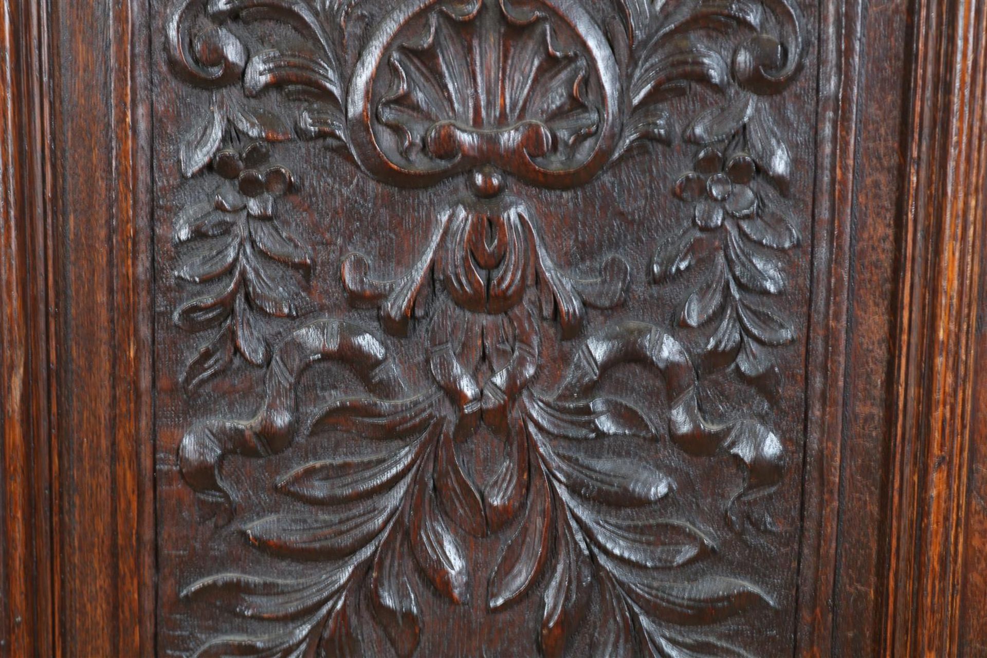 Oak two-door cupboard with 4 carved panels of garlands, putto, shell motifs and crown, flanked by - Image 7 of 9