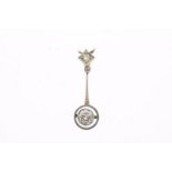 Bicolor gold pendant set with diamonds, old cut, gross weight 1.5 grams, length 2.5 cm.