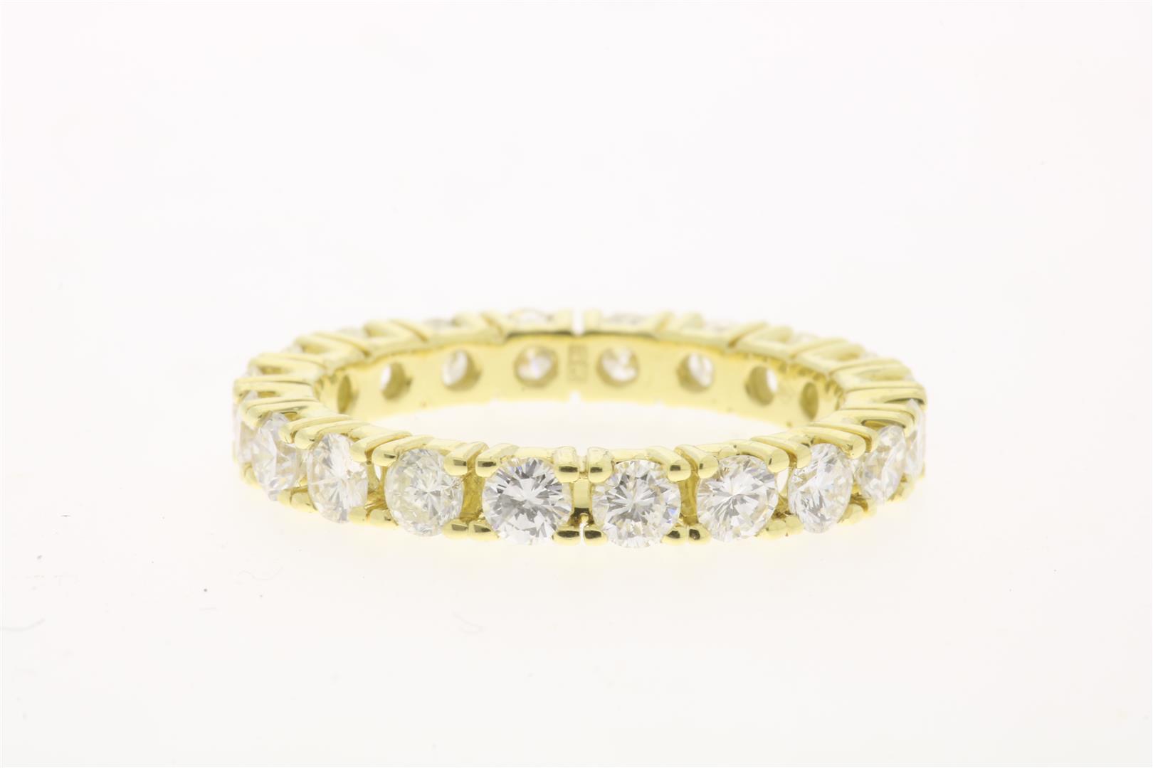 Yellow gold alliance ring set with brilliant cut diamonds, approximately 1.8 ct., F/G, VS/SI,