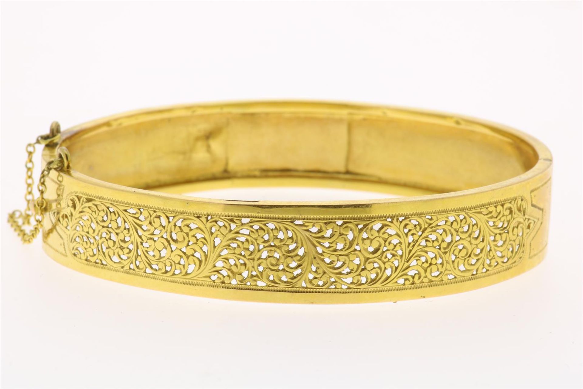 Yellow gold openwork rigid bracelet, with auction chain and box clasp, grade 585/000, 19th