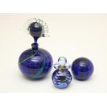 Lot of a blue thick glass paperweight, signed H. Rijn, thick glass stopper carafe with blown-in