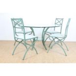 Series of 4 green matted Hollywood Regency-style chairs with gold-colored accents and a round dining