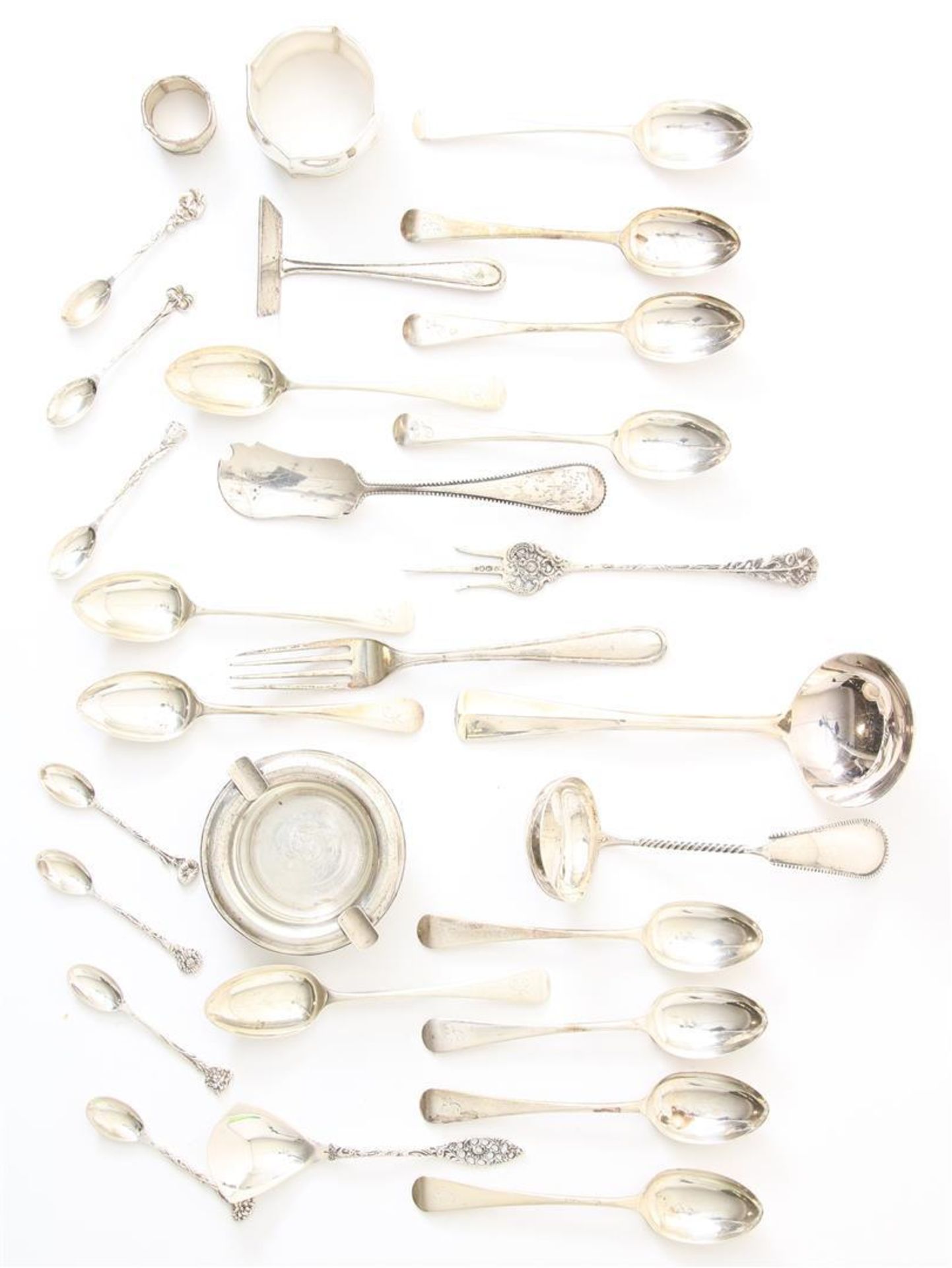 Lot of silverware and cutlery including coffee spoons, sauce spoon, napkin ring, ashtray of