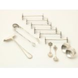 Lot of various silver, consisting of sugar cube tongs, cheese thumbs, Djokja knife rests, salt