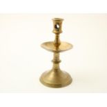 Bronze collar candlestick with ribs and round stitch hole, with flat button at the bottom,