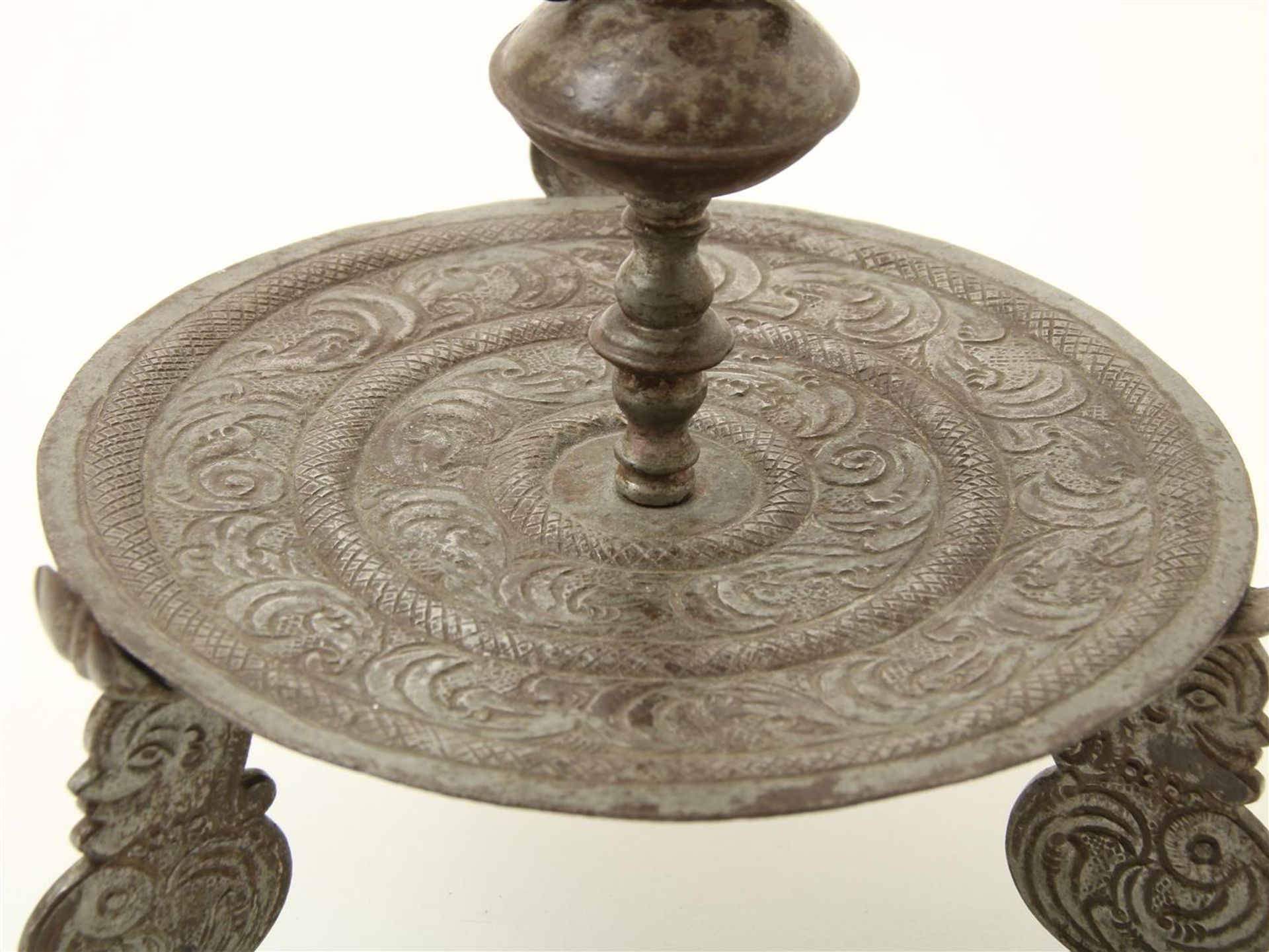 Iron candlestick, decorated with leaf motifs and legs with portraits, possibly Germany, 18th - Image 3 of 4