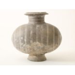 China, earthenware cocoon jar, Han dynasty ( 206 BC - 220 AD) The gray vessel moulded with