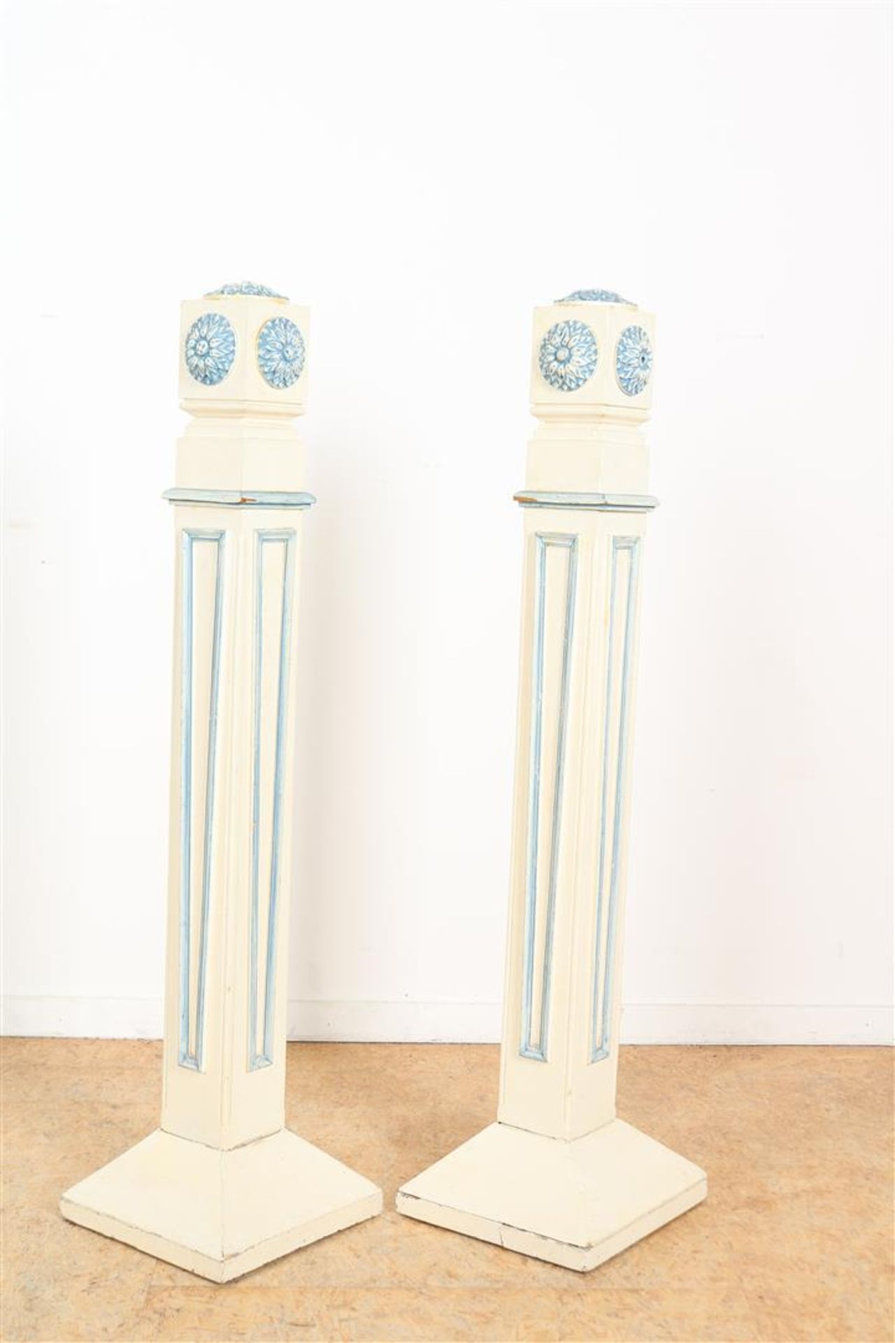 Set of white-painted decorative pillars 
