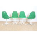 set of 4 Charles Eames-style chairs