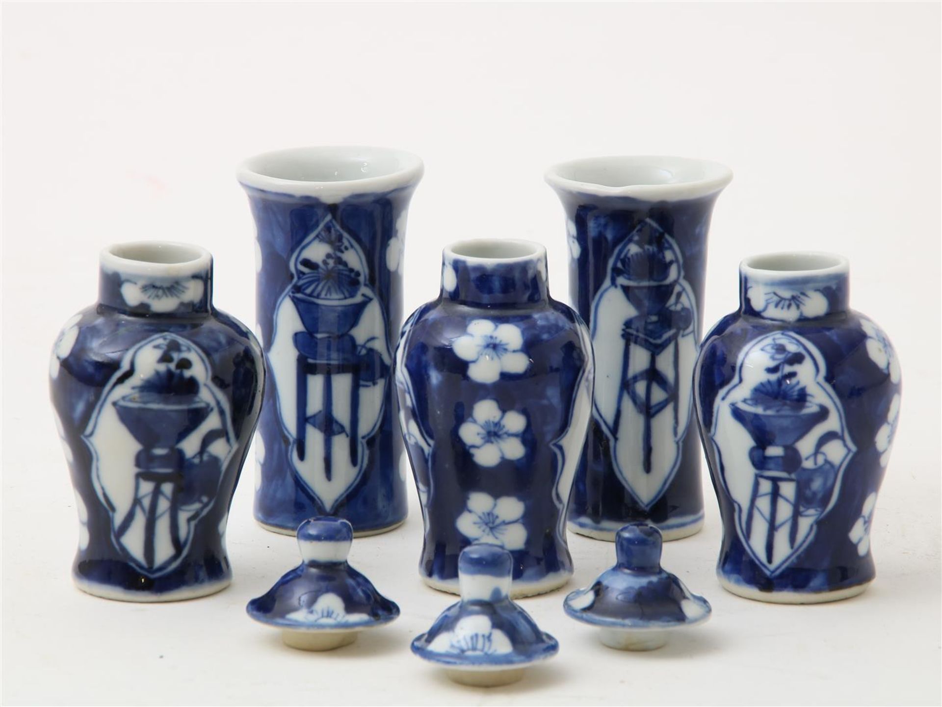 Porcelain miniature cupboard set, lidded vases and 2 tube vases decorated with cracked ice decor and - Image 2 of 4