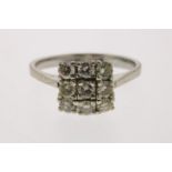 White gold ring with raised shoulders, set with 9 brilliant cut diamonds, square set, grade 585/000,