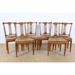 Series of 6 elm wood chairs with elaborate backrest and various green velvet seats, ca. 1800. (