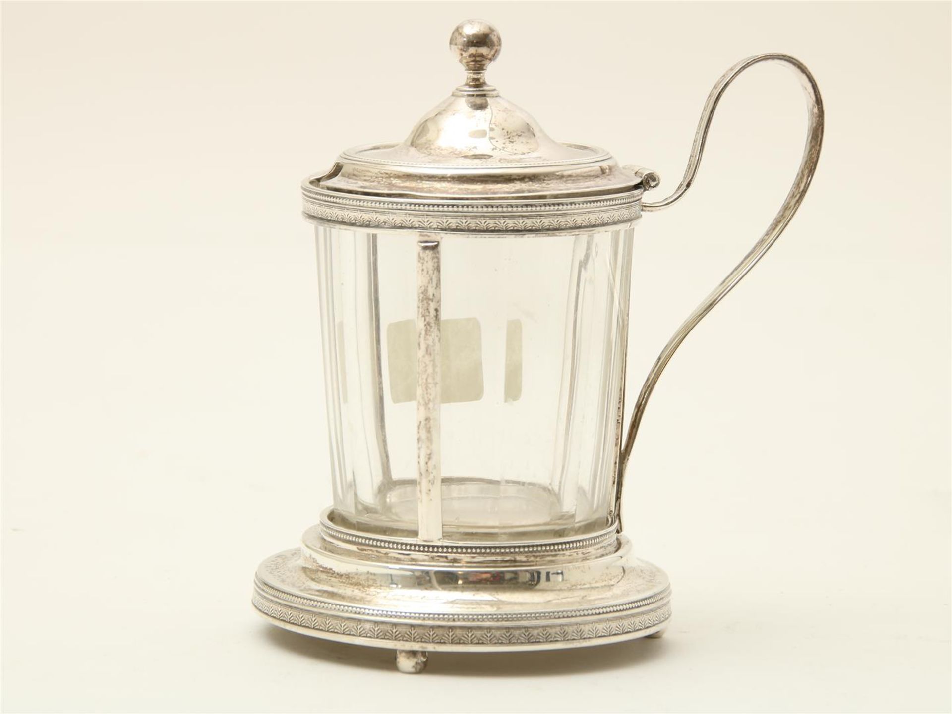 Silver mustard pot with glass inner container, Amsterdam, circa 1800, height approximately 10.5