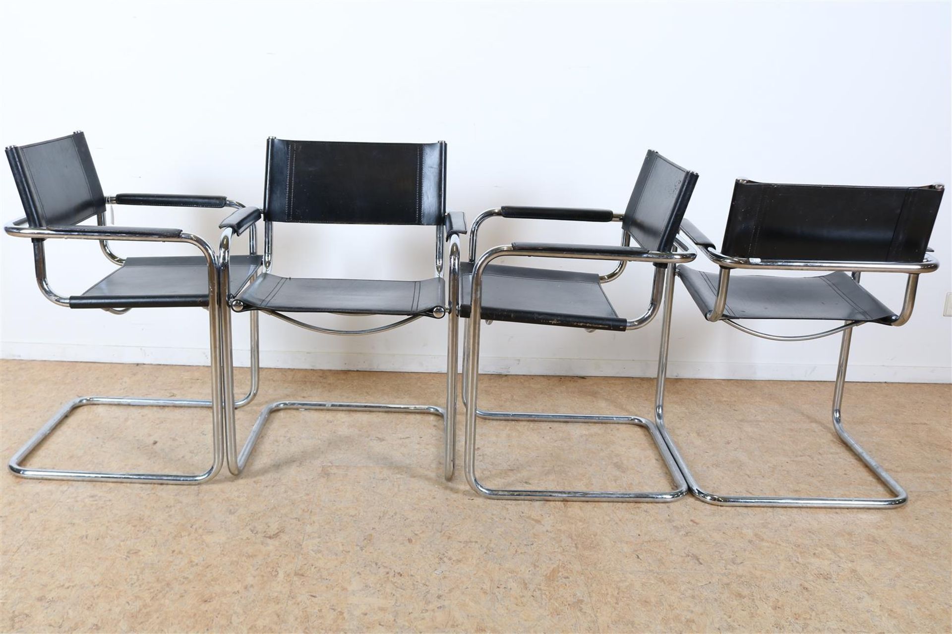 Series of 5 armchairs upholstered in black leather on a chrome tube base, after designer Marcel - Image 4 of 6