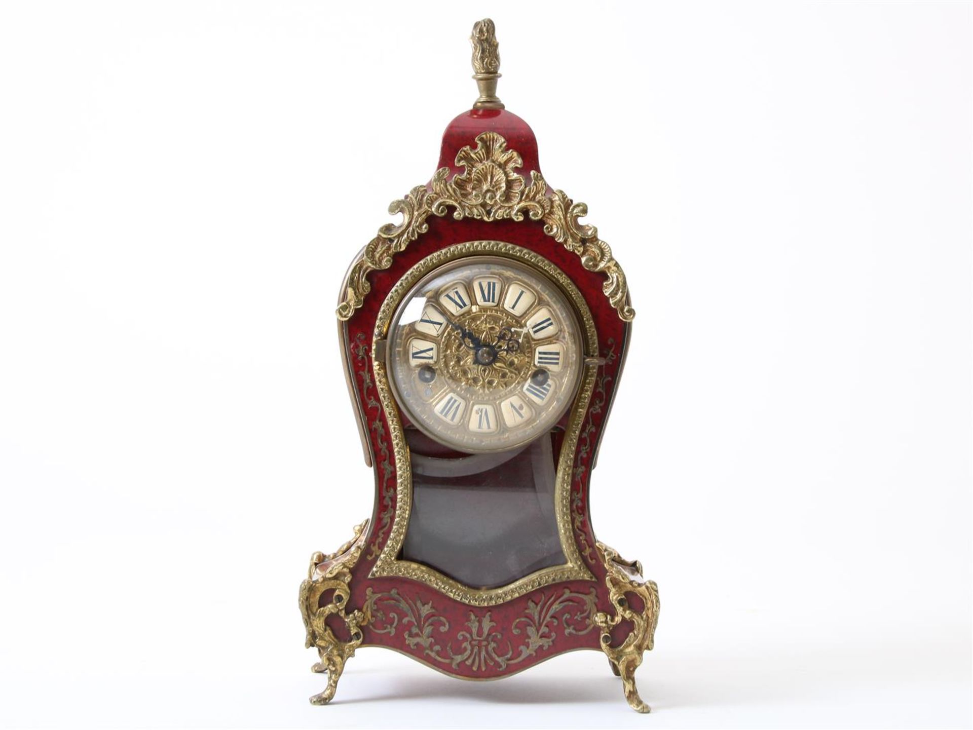 Table mantel clock in red lacquer case, Louis XVI style, with bronze frames and sundial pendulum, (