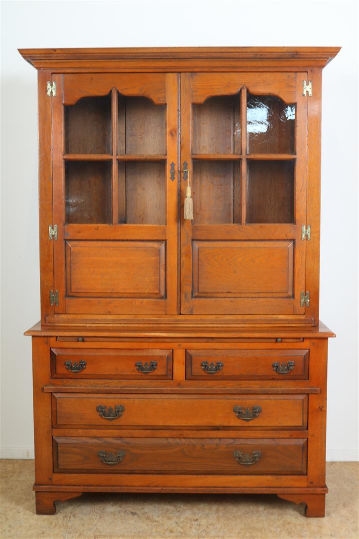Oak Schuitema bookcase with 2 glass doors, extendable writing area on 4 drawers, model Castle