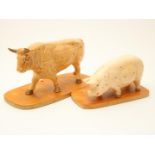 Lot of a porcelain cow and pig,