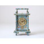 Gilt brass travel clock with copper dial with Roman numerals, alarm clock and repeating striking