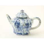 Porcelain lobed Kangxi teapot with long frame and floral decoration, China 18th century, height 10