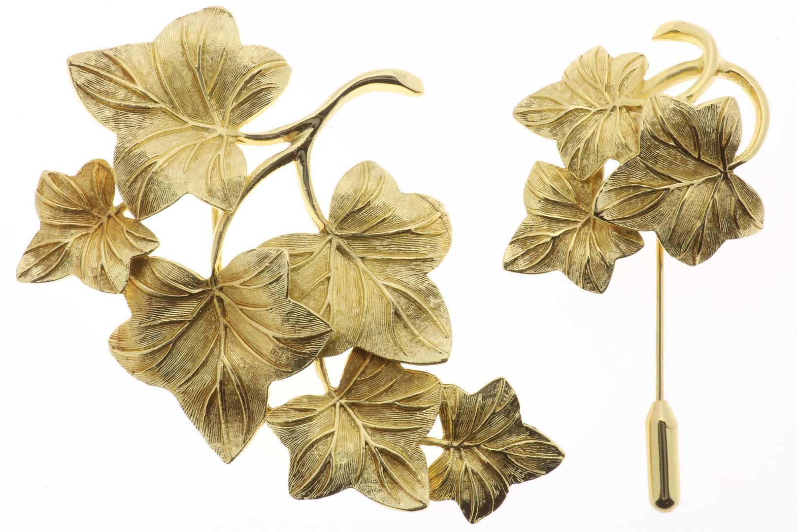 Two gold-plated brooches with ivy leaves, designed by Christiaan Dior in original box. 5 x 7.5, 6.