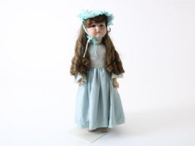 Doll with porcelain head