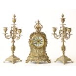 Bronze Napoleon III mantel clock with partly enamel dial with Roman numerals, with matching 3-