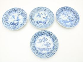 Set of 4 porcelain Qianlong saucers