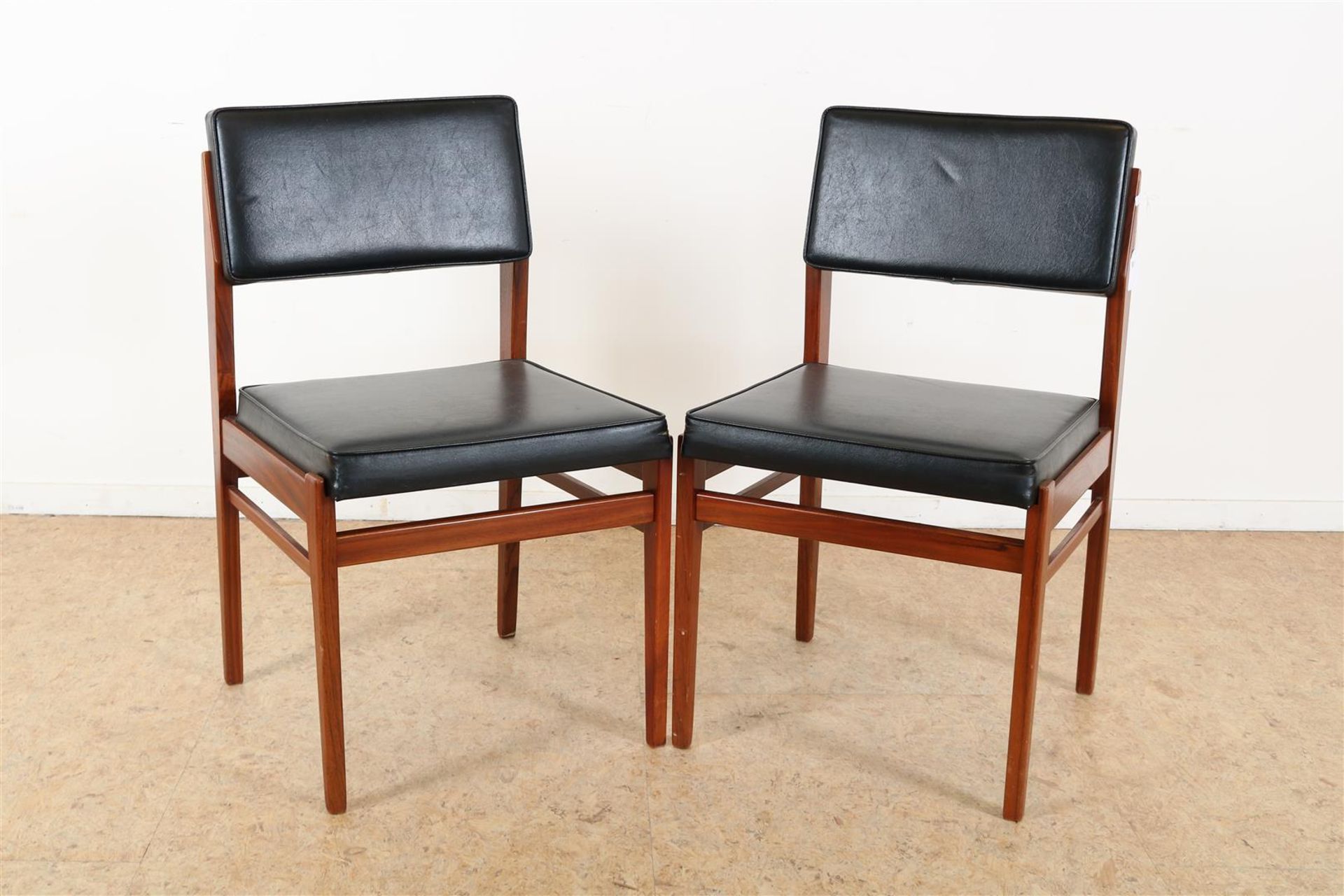 Set of teak Topform vintage chairs covered with black leatherette, 1960s. (sticker bottom)