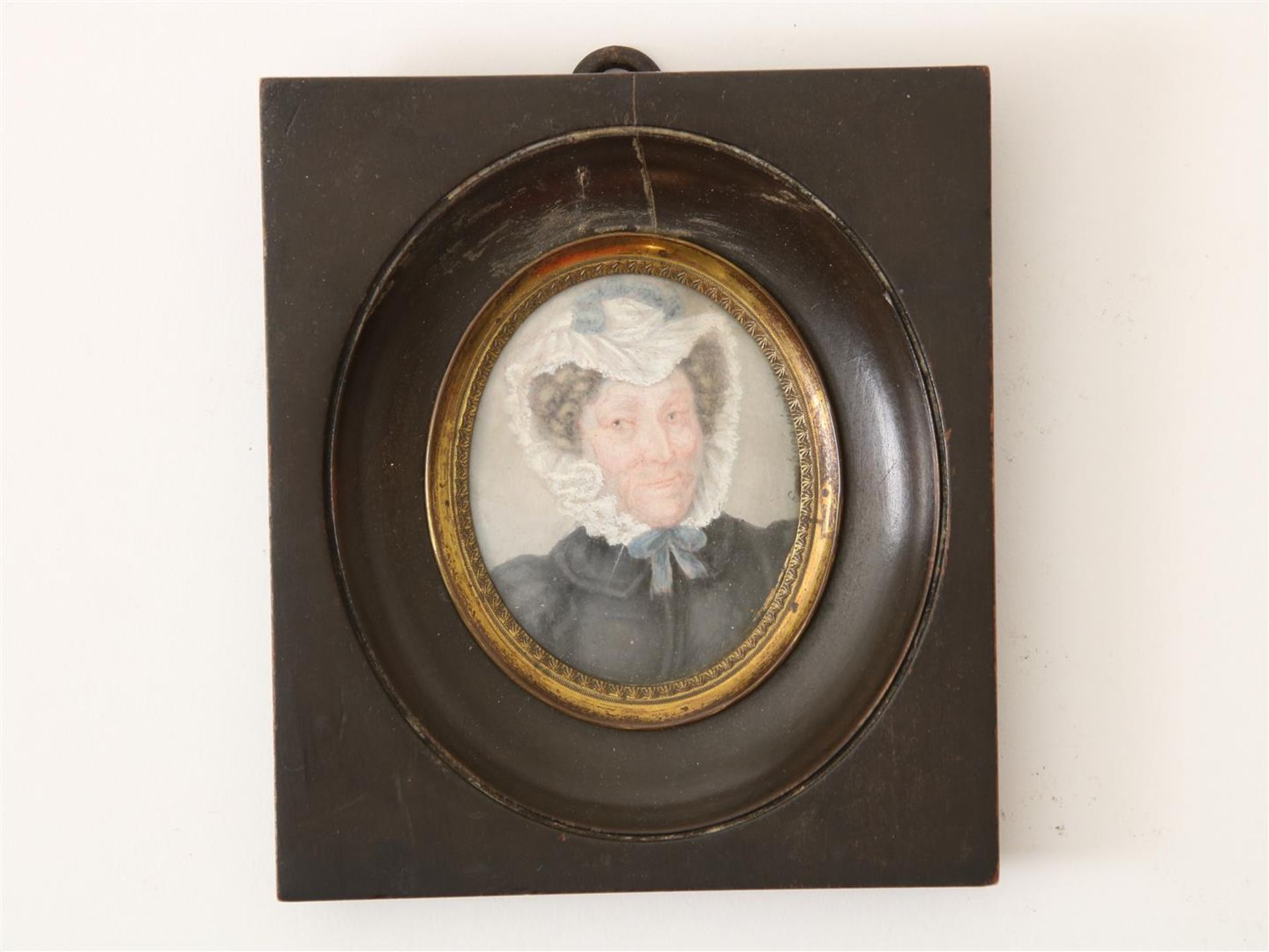 Miniature portrait with image of a lady, signed right Enzenberg 1828, watercolour, 13 x 10 cm.