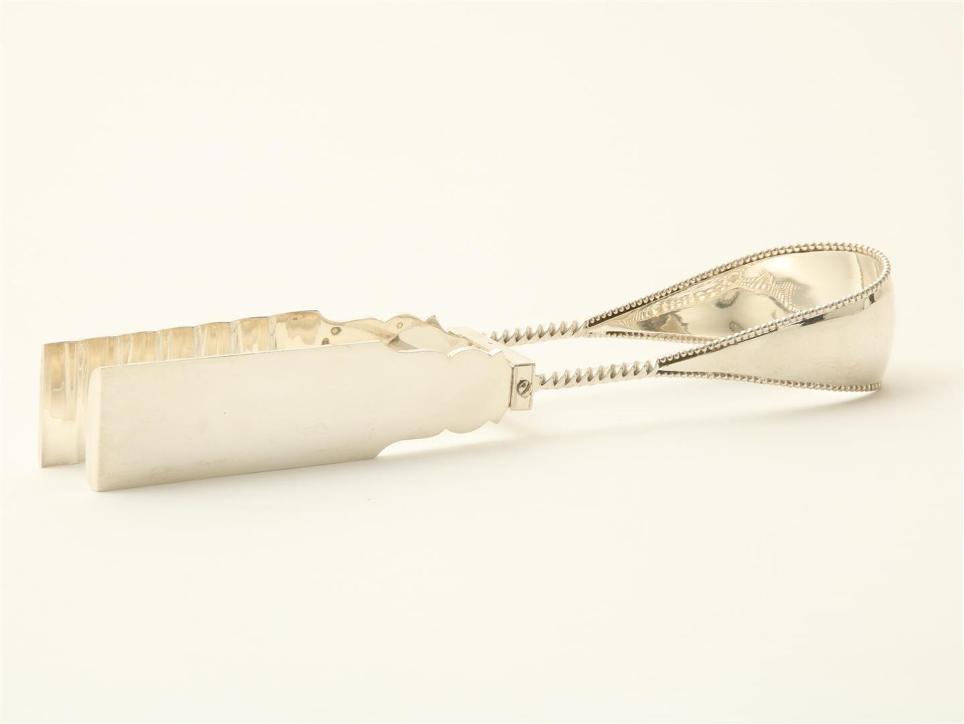 Silver asparagus tongs with pearl edge, size. Augustinus de Gilde, Amsterdam (1817-1827), year