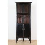 Black painted elm corner cabinet with 2 open compartments and 2 panel doors with bronze lock