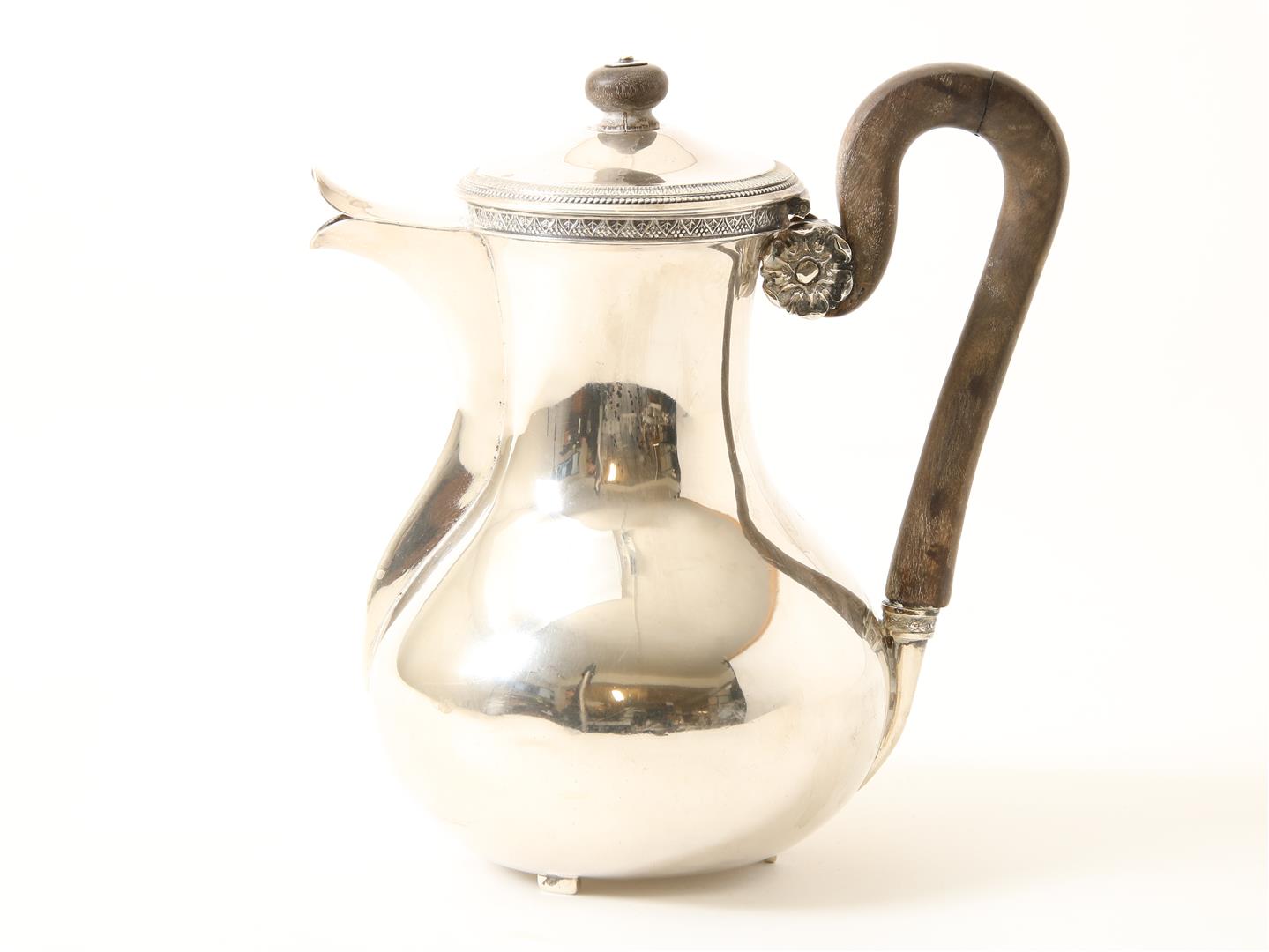 Silver coffee pot with wooden handle and knob, the lid decorated with pearl edge and palmette motif,