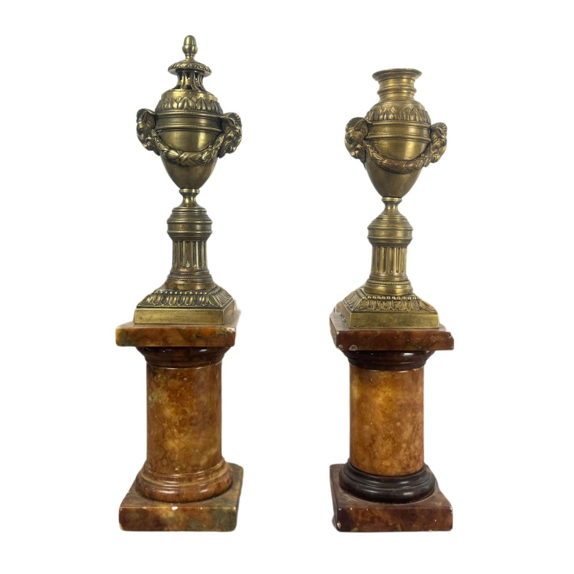 Pair of finely chiseled bronze candle holders