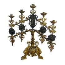 Finely chiseled and gilded bronze candelabrum