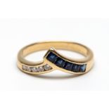 18 kt. Gouden v- vormige ring,